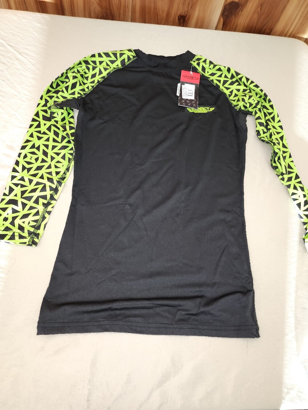 Black Rash Guard with Neon Green Geometric Sleeves